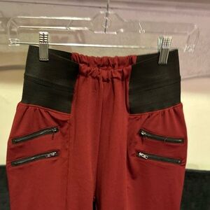 Stylish Wine/Red Pants with Black Zipper Accents